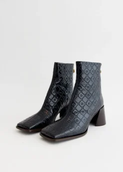 Moonogram Embossed Leather Block Boots