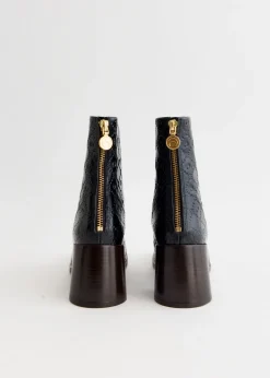 Moonogram Embossed Leather Block Boots