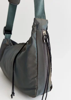 Keyhole Expandable Sling Bag