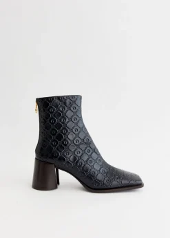 Moonogram Embossed Leather Block Boots