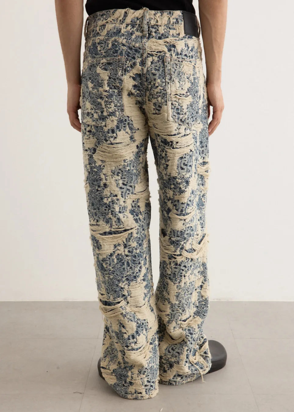 1981U Distressed Monogram Denim Jeans